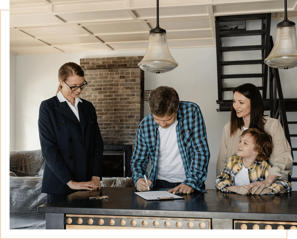 A family is standing around the kitchen table.